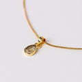 Ame Necklace con rutilo dorado y baño de oro de INDIGO